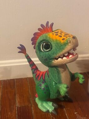 FurReal Friends Munchin' Rex interactive plush toy.